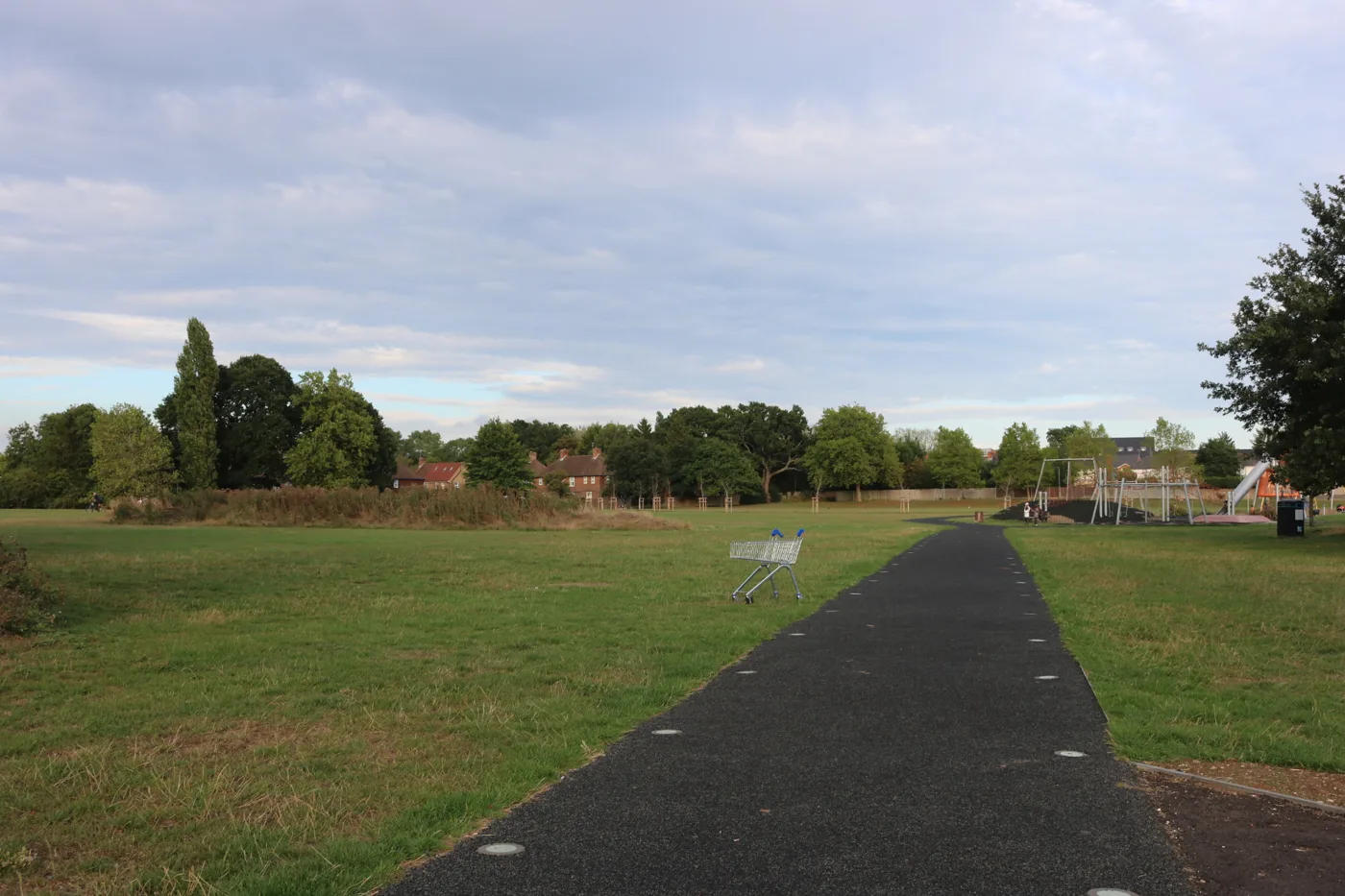 The path across Meadow Park, Borehamwood, looking towards the play area